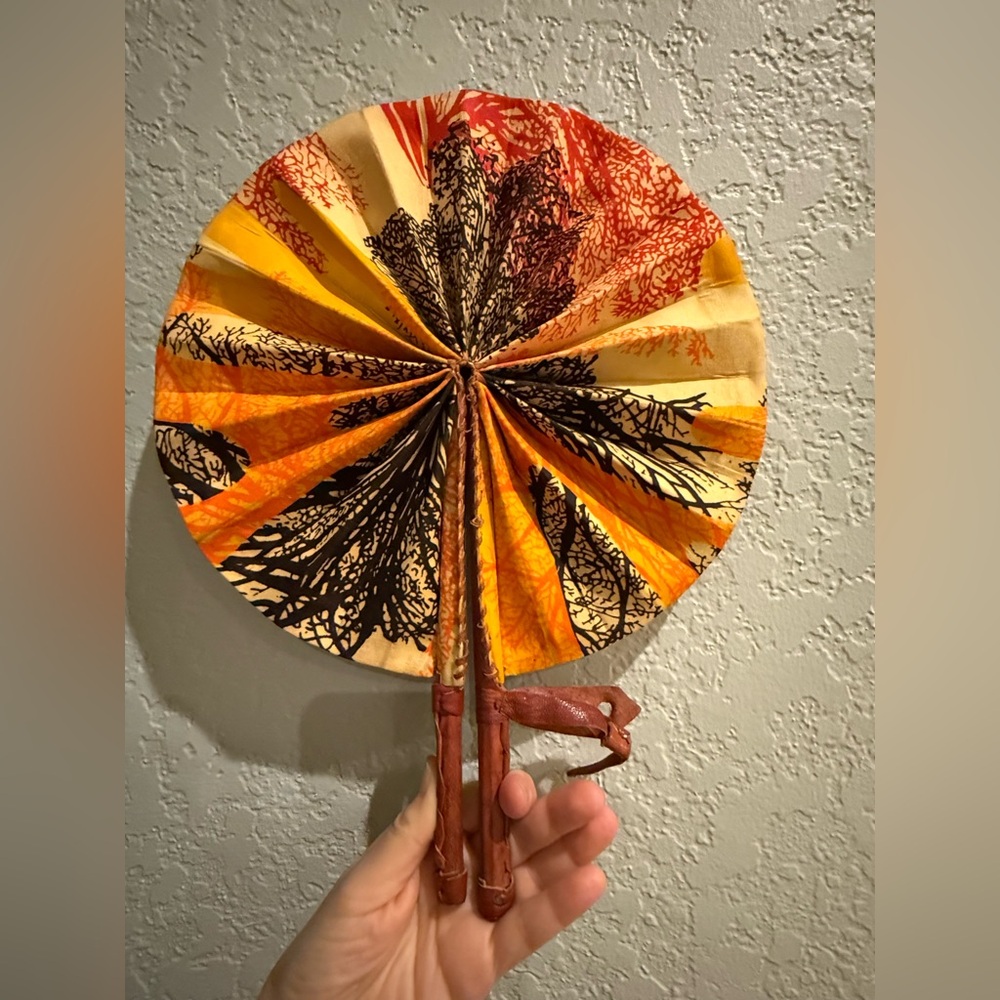 Handmade In Ghana Ankara Elegance
Folding Handheld Fan with Leather Handle